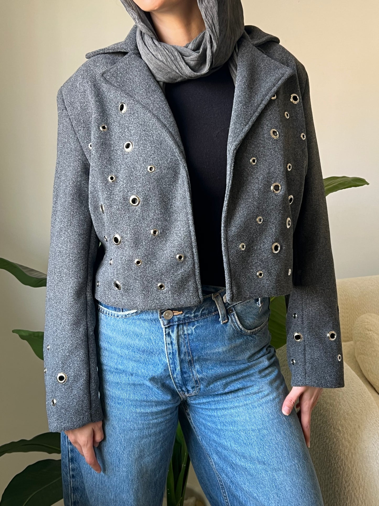 Pierced wool jacket in grey